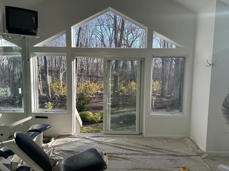 Casement windows with triangular windows on top in a gym in Guilford, CT